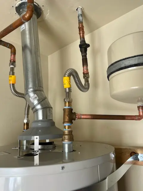 Water heater installation and plumbing repair in Pine Village Estates